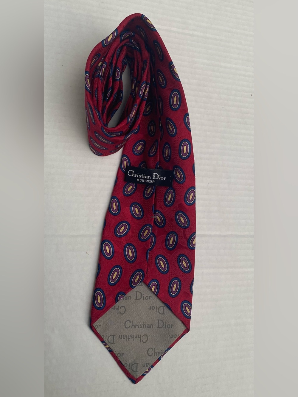 Dior Red Silk Tie with Blue and Gold Oval Pattern